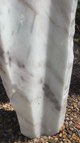 White Marble Fountain in landscape setting