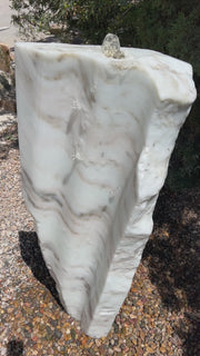 White Marble Fountain in landscape setting